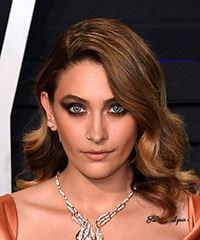 Paris Jackson Medium Wavy Layered   Brunette Bob  Haircut with Side Swept Bangs  and  Blonde Highlights