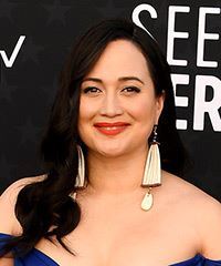 Lily Gladstone Hairstyle With Side Part And Curls- Visual Story