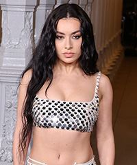 Charli XCX Curly Wet-Look Hairstyle- Visual Story