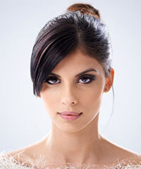 Elegant Updo Hairstyle With Dramatic Side-Swept Fringe- Visual Story